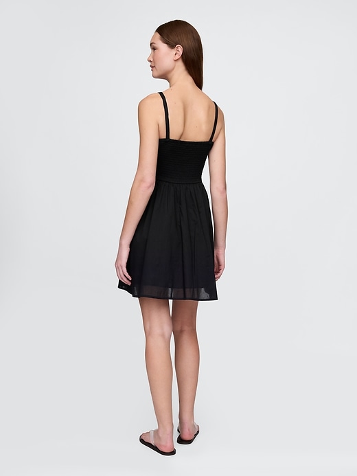 gehäkeltes minikleid aus verschiedenen materialien