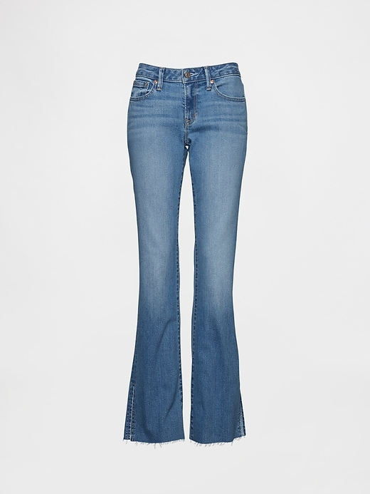 hüftjeans lang und schmal geschnitten mit schlitzsaum