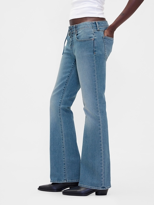 hüftjeans mit schnürung lang und schmal geschnitten
