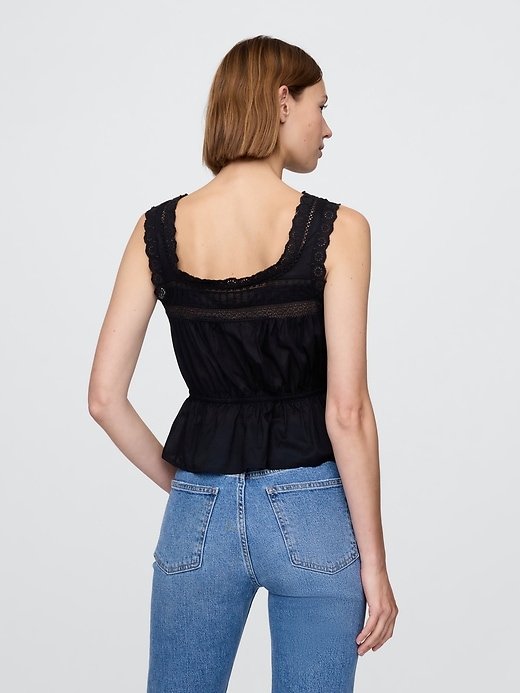 peplum-top mit spitzenbesatz