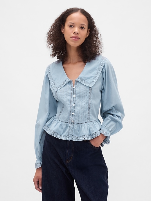 peplum-top mit kragen und v-ausschnitt