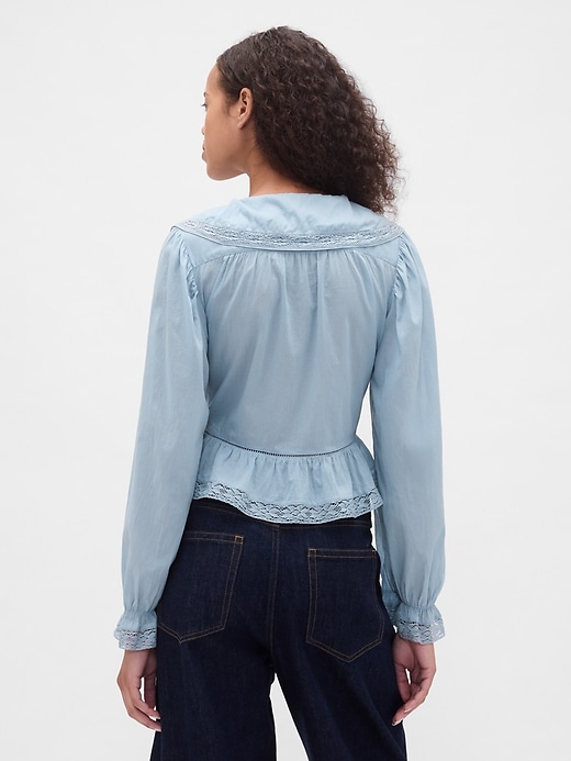 peplum-top mit kragen und v-ausschnitt