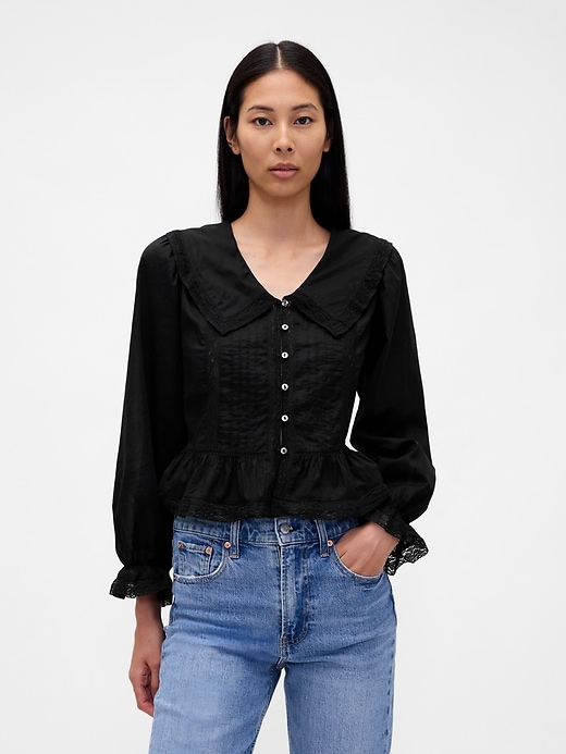 peplum-top mit kragen und v-ausschnitt