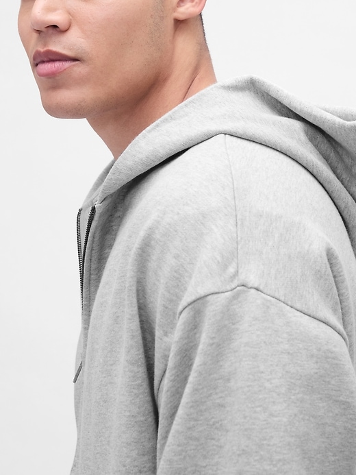 schwerer oversize-kapuzenpullover mit reißverschluss