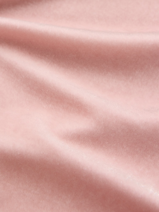 baby- und kleinkind-overall aus velours mit schleifenärmeln