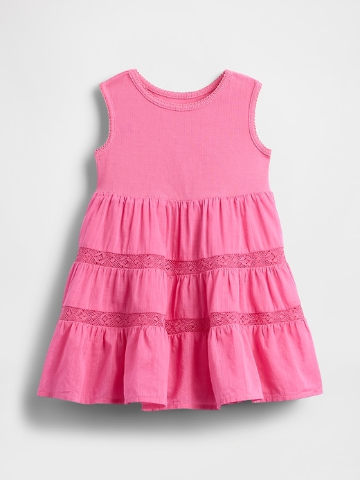 kleid aus spitzenbesatz und verschiedenen materialien für babys und kleinkinder