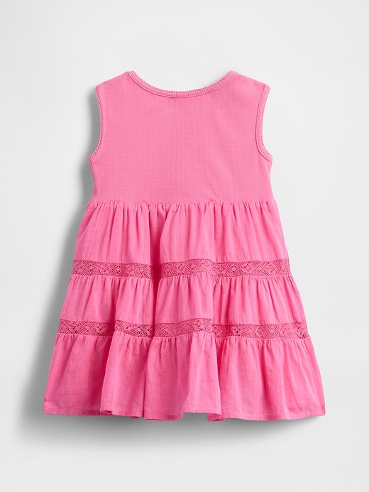 kleid aus spitzenbesatz und verschiedenen materialien für babys und kleinkinder