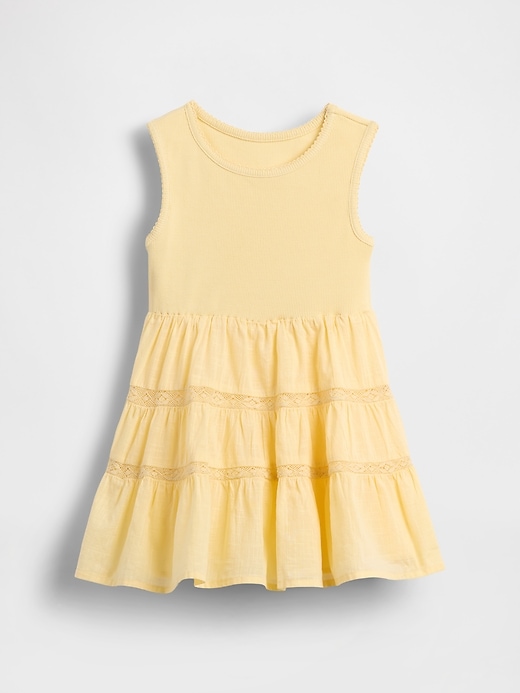 kleid aus spitzenbesatz und verschiedenen materialien für babys und kleinkinder