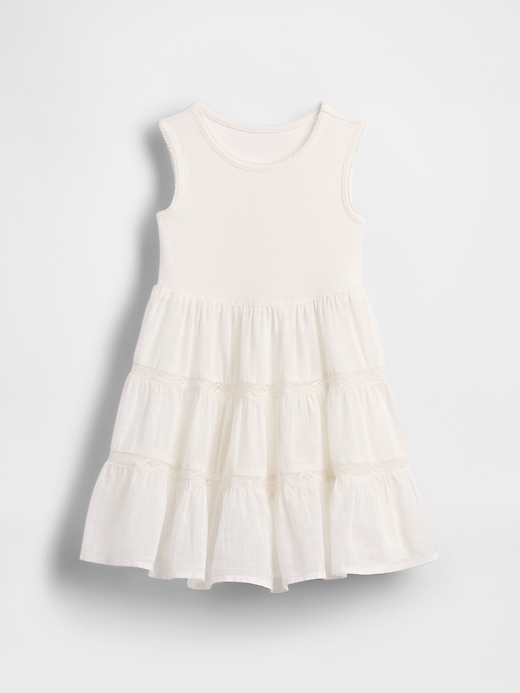 kleid aus spitzenbesatz und verschiedenen materialien für babys und kleinkinder