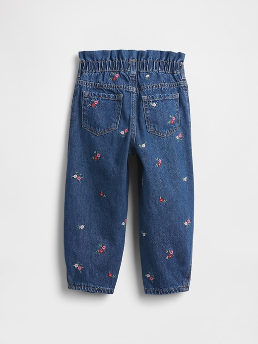 baby- und kleinkind-jeans mit blumenmuster und hufeisenmuster