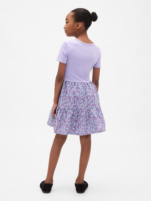 kinderkleid aus verschiedenen materialien mit volant