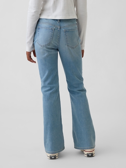 kinder-schnürjeans im 70er-jahre-stil mit hohem bund und schlaghose