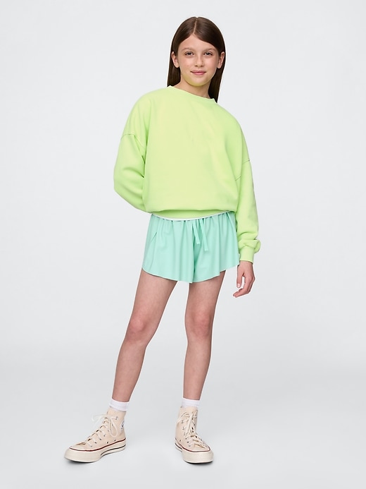 kinder-laufshorts mit schmetterlingsaum