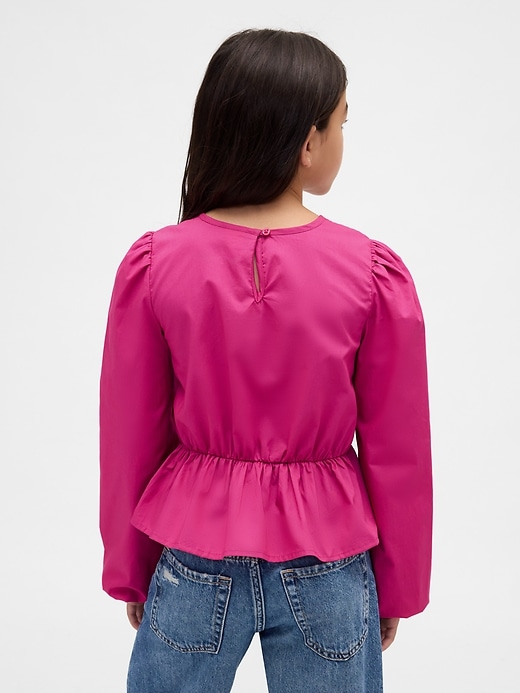 kinder-peplum-top mit smok-einsatz